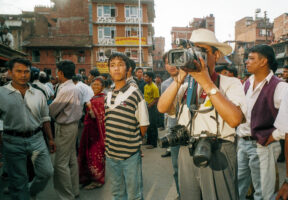 KATHMANDU 29. APRIL 2000 - Ein Tourist filmt ein Folksfest in Neplas Stadt Patan.

Photo by Daniel Ammann