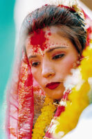 KATHMANDU 7. APRIL 2000 - Die Braut schaut in Nepals Hauptstadt Kathmandu waehrend einer Traditionellen Hochzeit auf den Boden.

Photo by Daniel Ammann